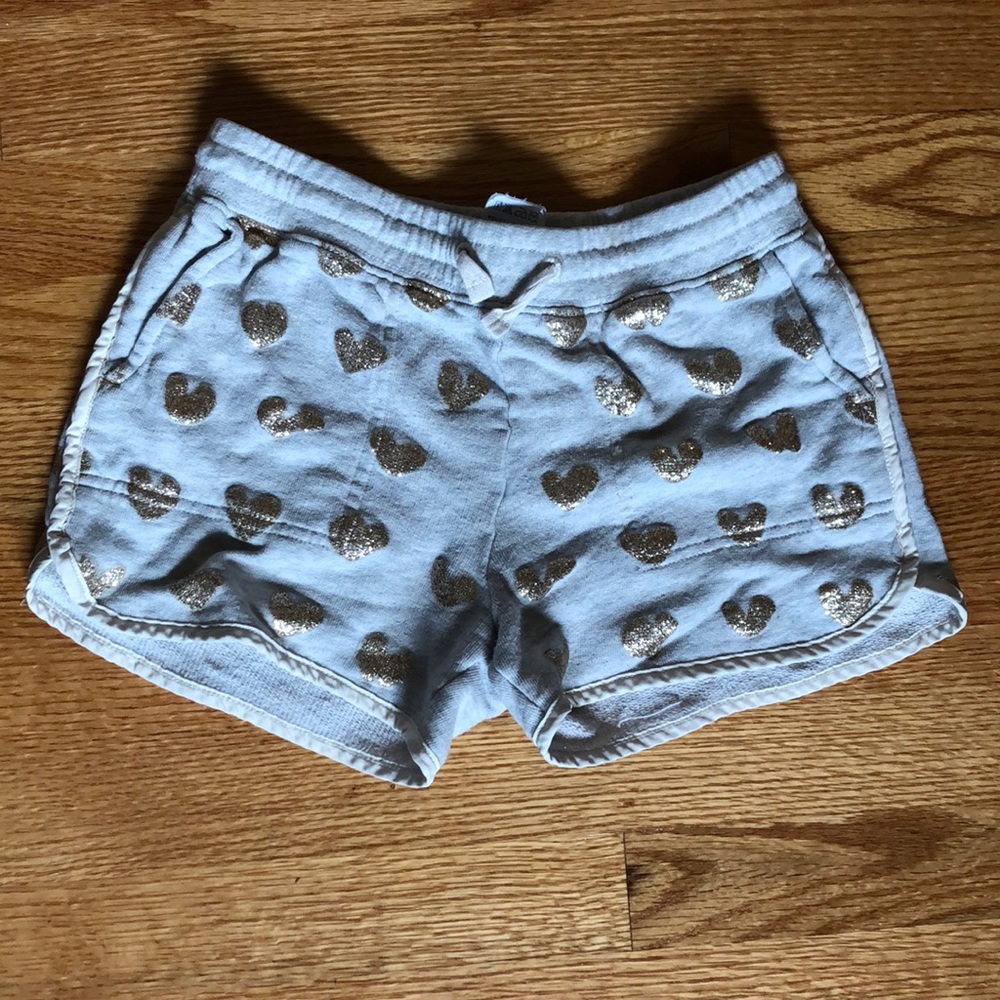 Heather gray shorts with gold glitter hearts